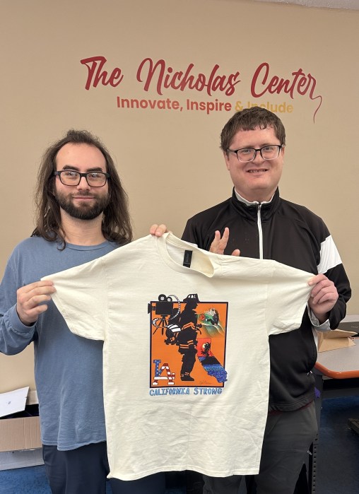 Members of The Nicholas Center with Kyle's shirt design. 