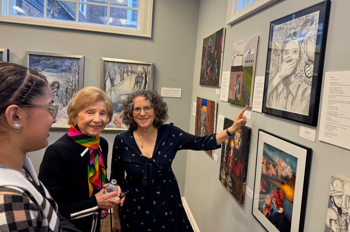 Genesis Carranza, Holocaust survivor Rosalie Simon and Janet Lust Ganes (L. to R.) at the exhibit's opening reception