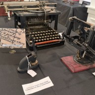 Typewriter and embossers on display at the historical society exhibit right now