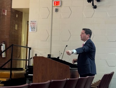 David Steinberg, assistant superintendent for secondary curriculum, instruction and assessment, addresses the Syosset Board of Education on Monday, March 10