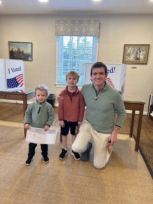 Mayor Lawrence Ceriello's son casting his vote with the mayor's grandsons