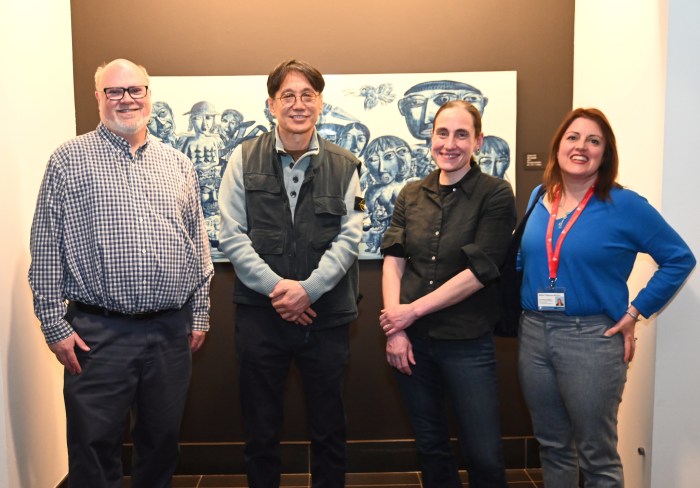 Richard Helling, artist Sunkoo Yuh, Stony Brook Associate Professor of Social Welfare Robin Deluca-Acconi and Haylee Hebenstreit attended the lecture and reception in the Charles Wang Center.