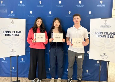 South High School sophomore Isabella Fong (center) won the Long Island Brain Bee competition