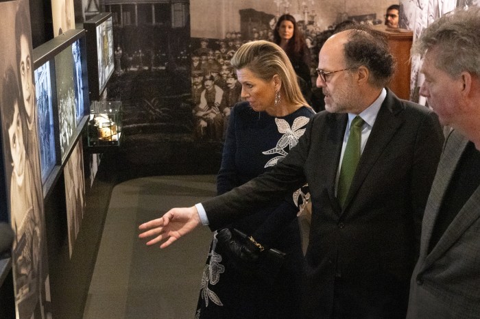 Queen Maxima with Ronald Leopold and Tom Brink inside Anne Frank The Exhibition