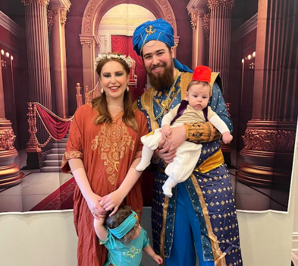 Chabad of Manhasset's Rabbi Levi Paltiel with his family at the "Purim in Persia" celebration