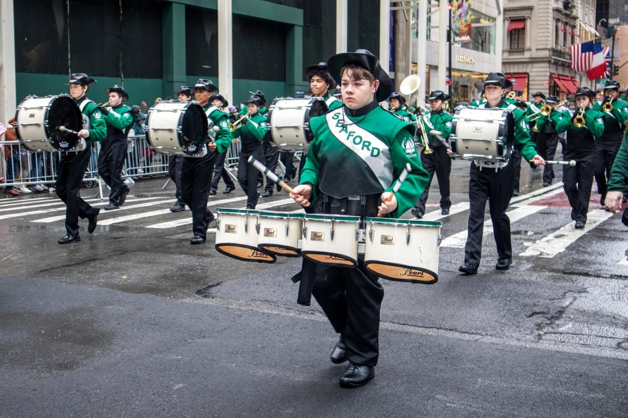 The Seaford High School marching band impressed NYC St. Patrick's Day parade onlookers with their synchrony and musical skill.