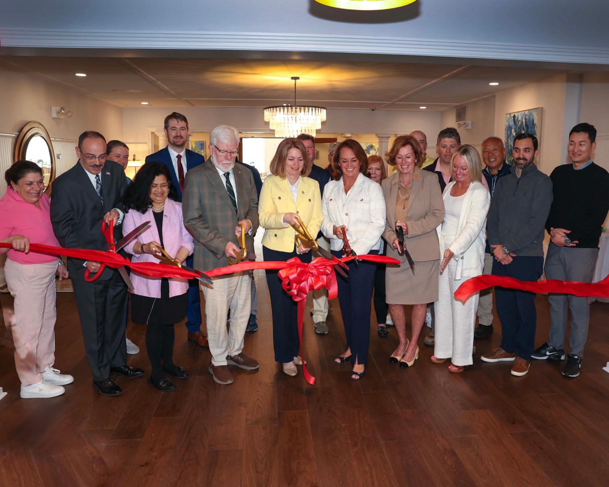 Town of North Hempstead Supervisor Jennifer DeSena and Harbor Links director Kelley Brooke join with North Hempstead Town Board Members and staff at ribbon-cutting ceremony for golf course renovations.