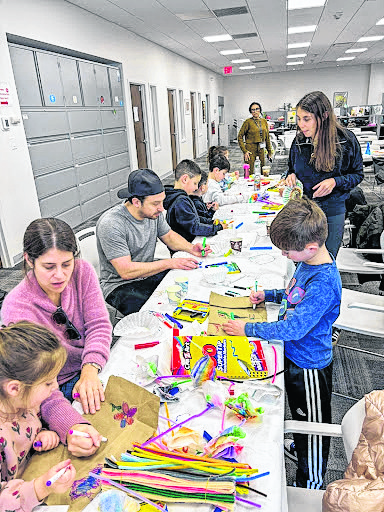 Parents and kids took part in Sid Jacobson JCC's Random Act of Kindness Day.