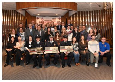 The Massapequa Chamber of Commerce honors four volunteer firefighters