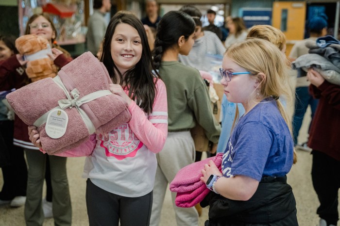 Students bringing donations for Wildlife Center of Long Island